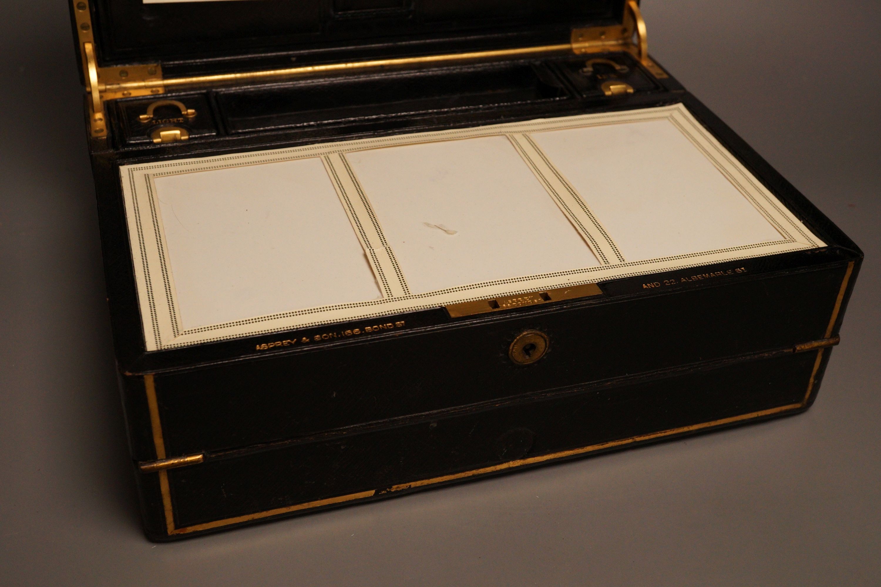 An Asprey & Son Morocco leather clad travelling writing box, 31 cm wide